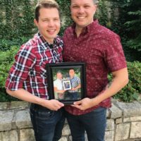 aaron-and-jimmy-21 - couple-holding-picture