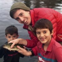 cody-and-kelsey - with-kids-holding-fish.jpg