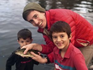 cody-and-kelsey - with-kids-holding-fish.jpg